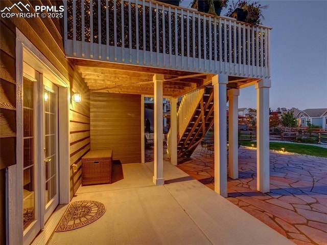 view of patio terrace at dusk