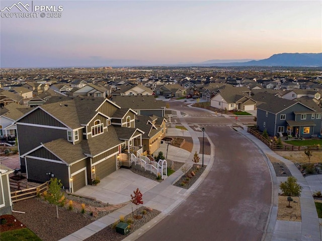 aerial view at dusk with a mountain view