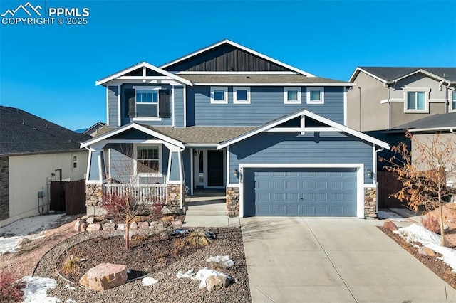 craftsman-style house featuring a porch and a garage