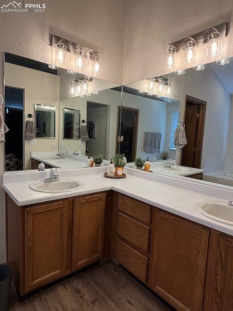 bathroom featuring vanity and hardwood / wood-style flooring