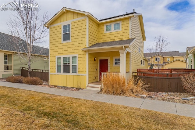 view of front of home featuring a front lawn