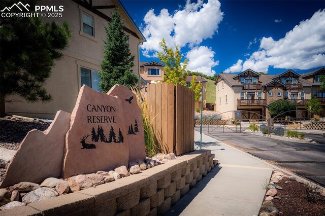 view of community sign