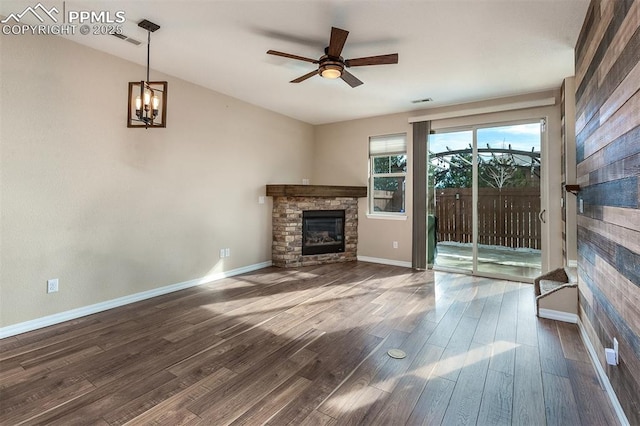 unfurnished living room with hardwood / wood-style flooring, ceiling fan, and a fireplace