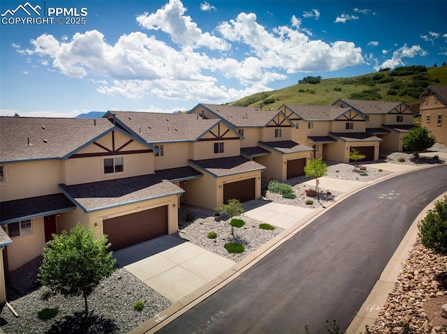 view of front of property with a mountain view