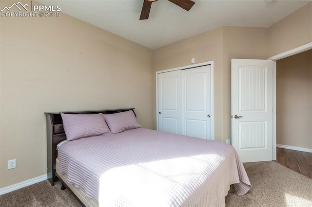 carpeted bedroom with a closet and ceiling fan