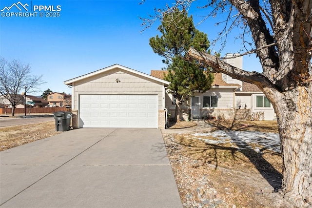 single story home featuring a garage