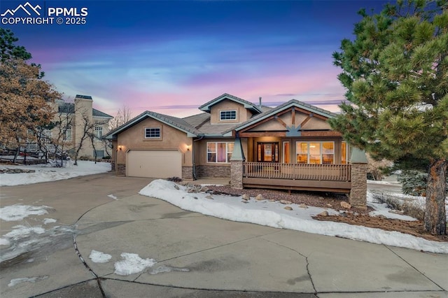 craftsman house with a garage