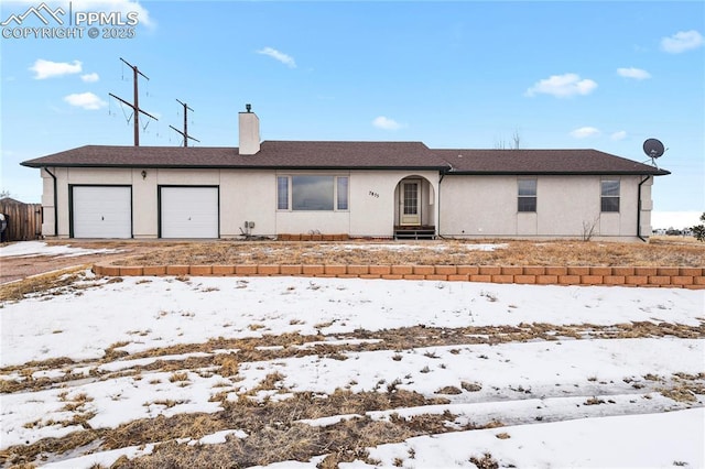 ranch-style house with a garage