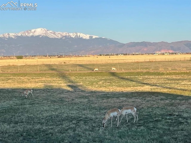 view of mountain feature featuring a rural view