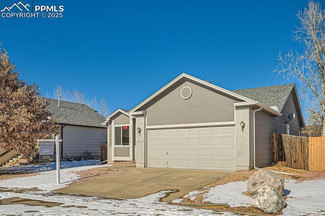 ranch-style house with a garage