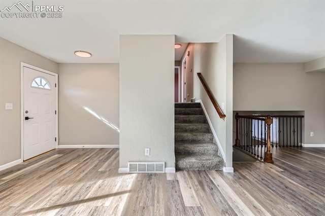 foyer featuring hardwood / wood-style floors