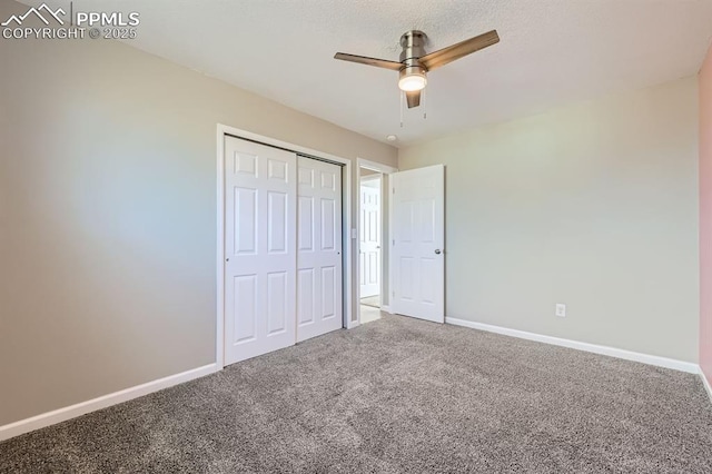 unfurnished bedroom featuring carpet floors, a closet, and ceiling fan