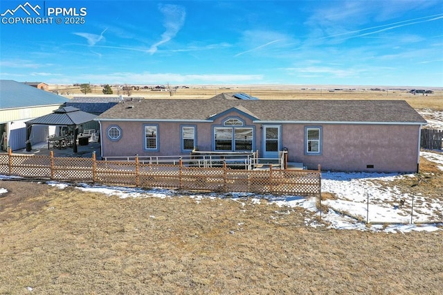 view of front of home featuring a gazebo