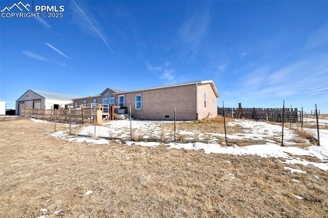 view of snow covered property