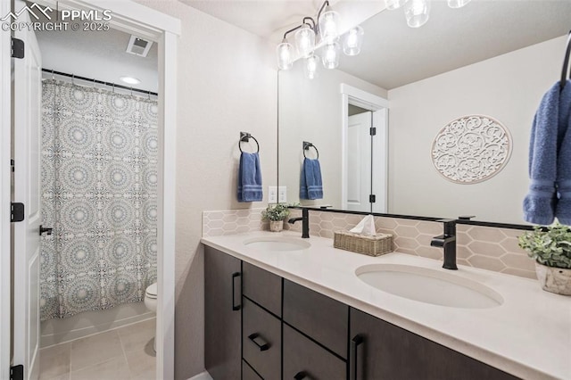 full bathroom with decorative backsplash, vanity, toilet, shower / bathtub combination with curtain, and tile patterned floors