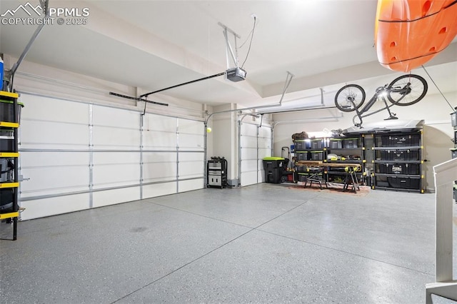 garage featuring a garage door opener