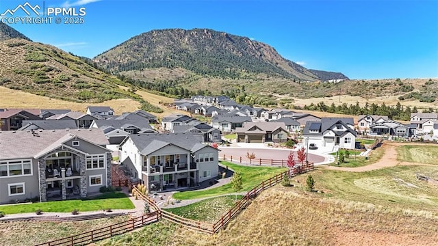 drone / aerial view featuring a mountain view