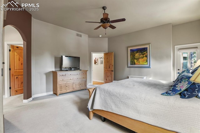 carpeted bedroom with ceiling fan