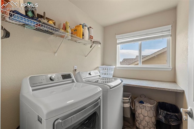 washroom featuring separate washer and dryer