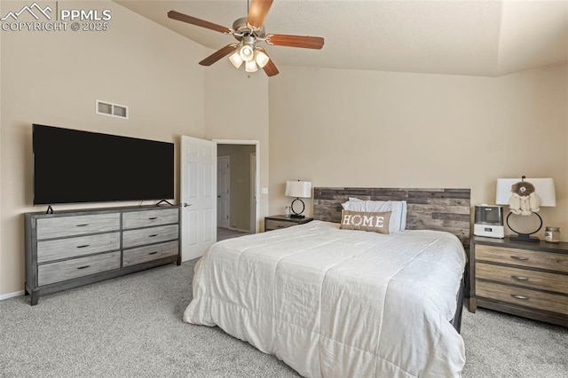 bedroom featuring light carpet, high vaulted ceiling, and ceiling fan