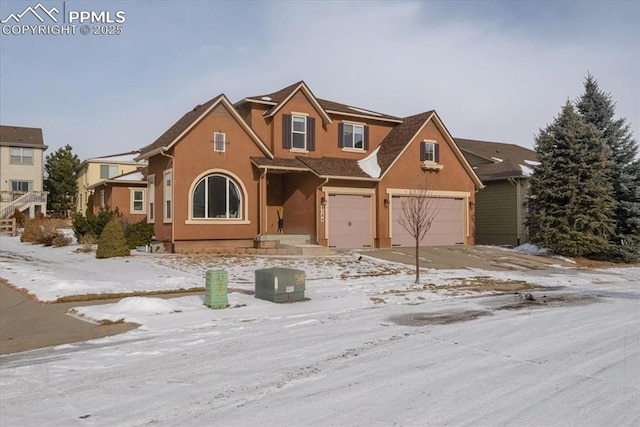 view of front of house with a garage