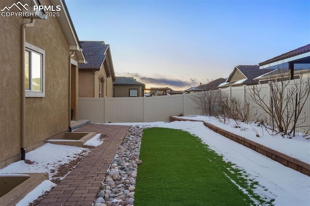 view of yard covered in snow