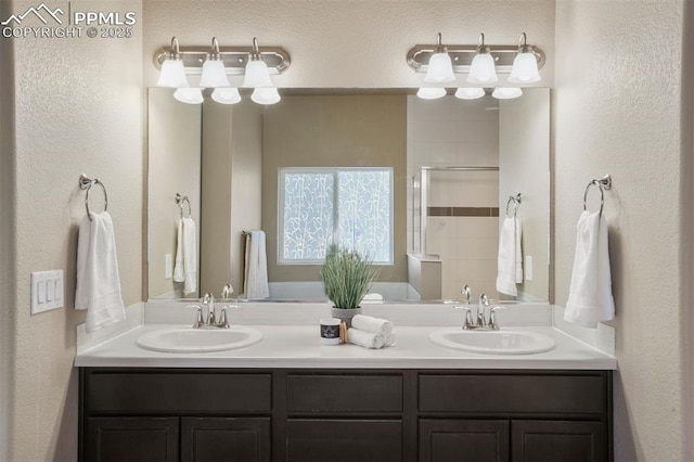 bathroom with vanity and walk in shower