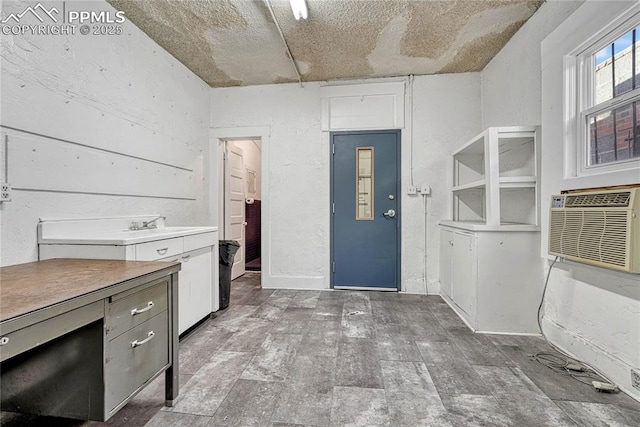 kitchen with an AC wall unit