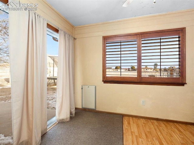 spare room featuring hardwood / wood-style flooring