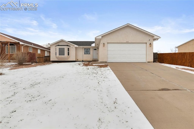 single story home with a garage