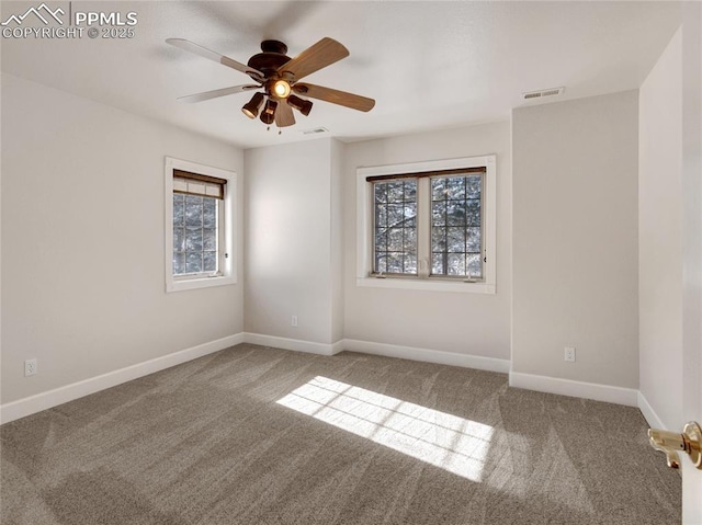 unfurnished room featuring carpet floors and ceiling fan