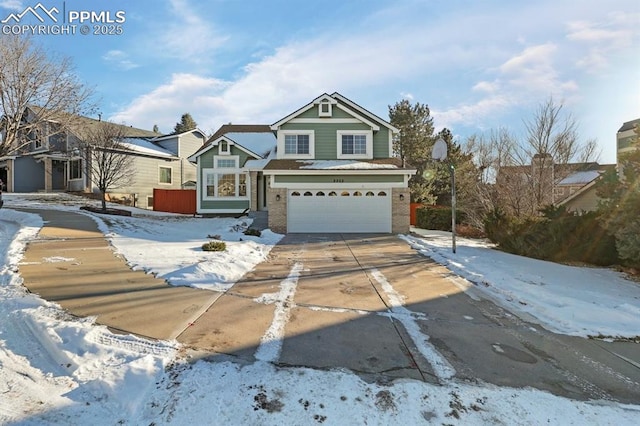 view of front of property with a garage