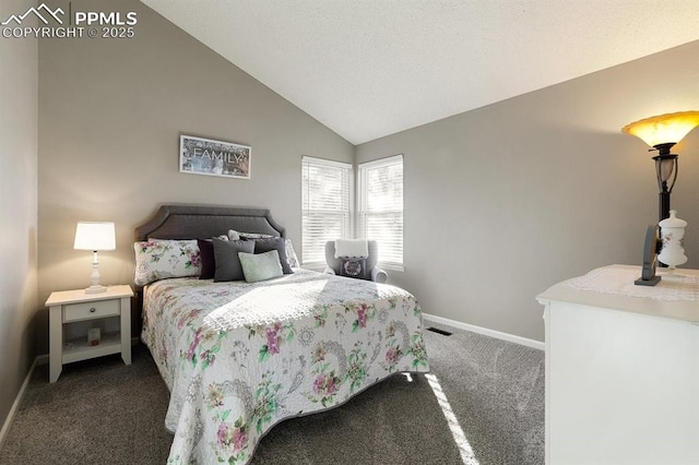 carpeted bedroom with vaulted ceiling