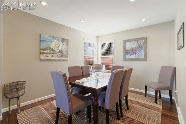 dining room featuring dark wood-type flooring