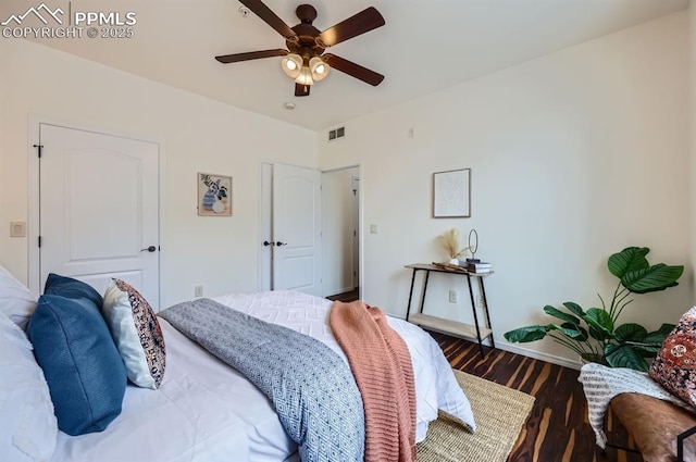 bedroom featuring wood-type flooring and ceiling fan