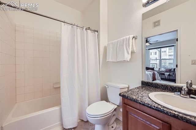 full bathroom with vanity, toilet, and shower / bath combo with shower curtain