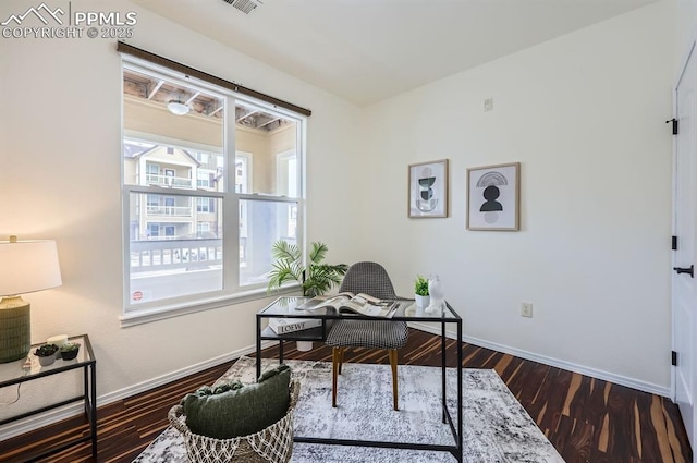 home office with hardwood / wood-style flooring