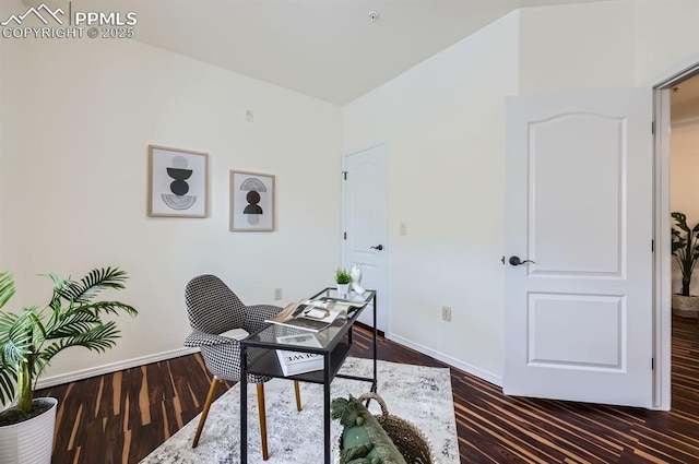 home office with dark hardwood / wood-style flooring