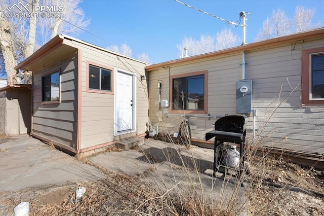 rear view of house featuring a patio area