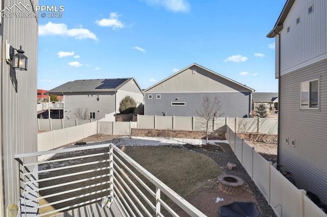 view of yard featuring a fire pit