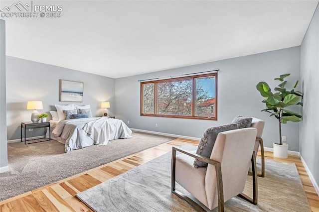 bedroom with light hardwood / wood-style floors