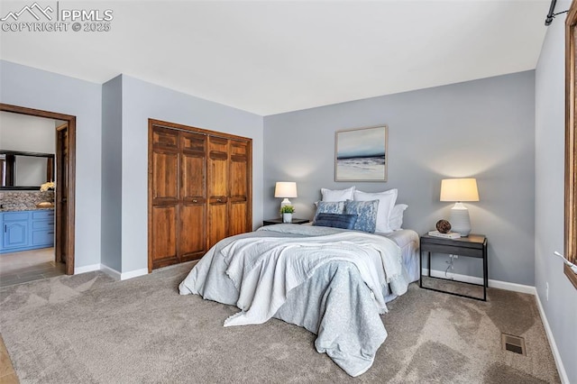 carpeted bedroom featuring a closet