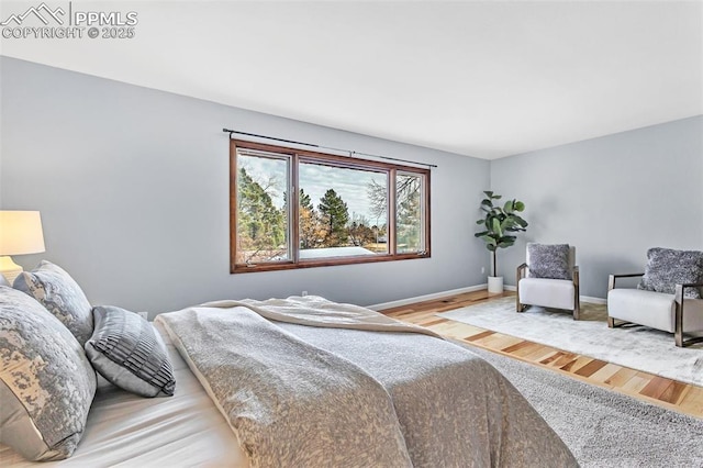 bedroom featuring hardwood / wood-style flooring