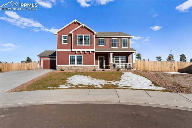 view of front of home featuring a garage and covered porch