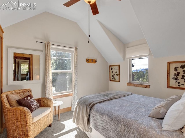 bedroom with vaulted ceiling, carpet flooring, and a ceiling fan