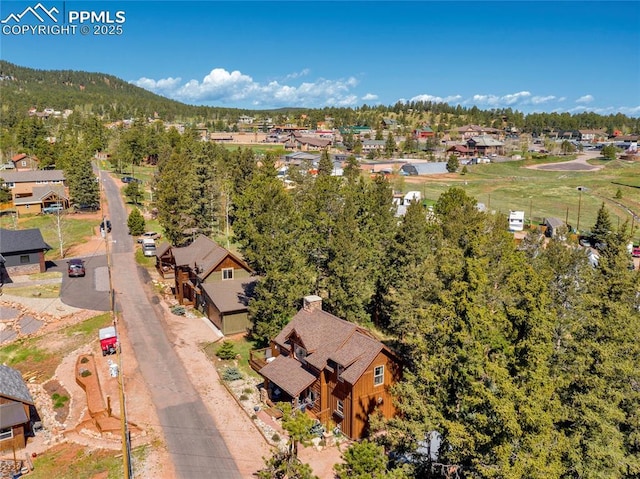 bird's eye view with a mountain view and a residential view