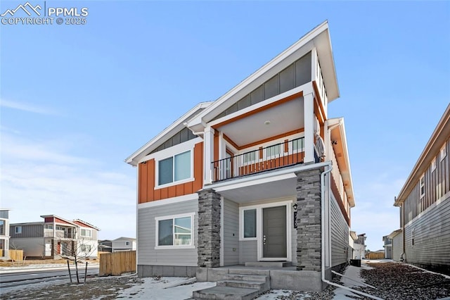 view of front of property with a balcony