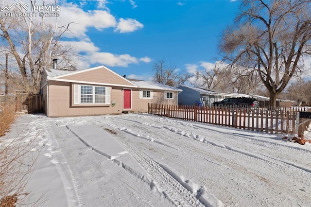 ranch-style house with a carport