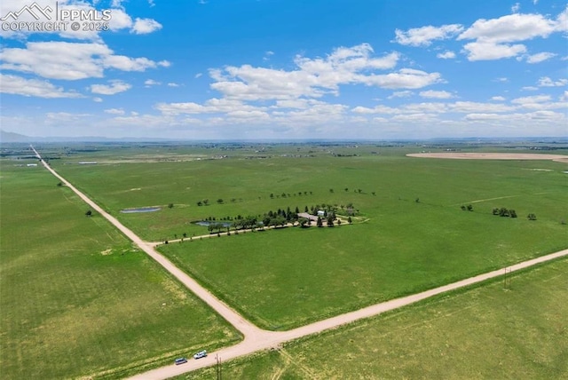 birds eye view of property featuring a rural view