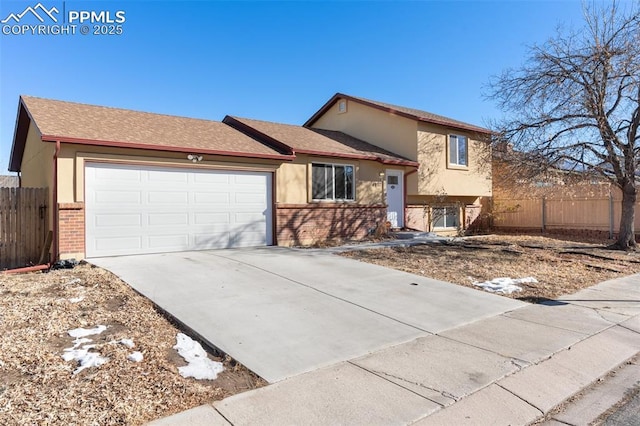 tri-level home featuring a garage